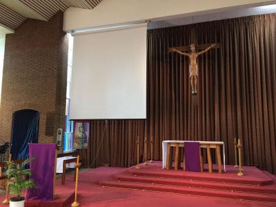 finished_screen_distance_resized Fitted a Hanging projection screen above the church stage.